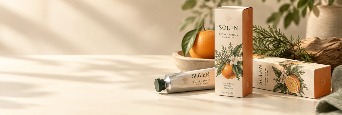 Orange and ivory Solen hand-cream folding cartons with premium printed artwork